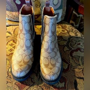 Brand new without tags gorgeous monogram Coach booties. Size 7.
